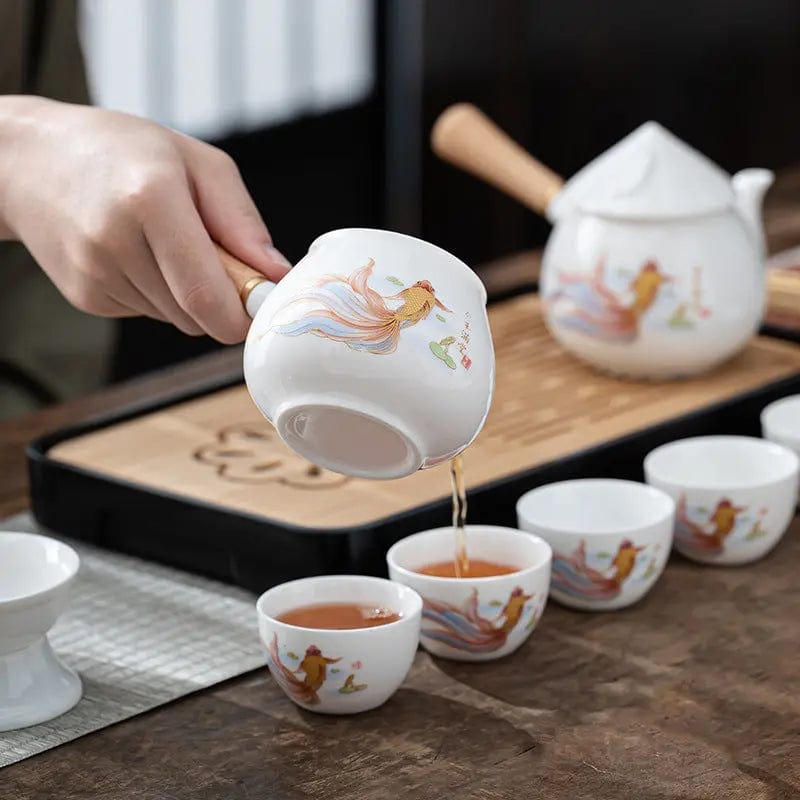 Chinese White Porcelain Tea Set with Elegant Fish Pattern